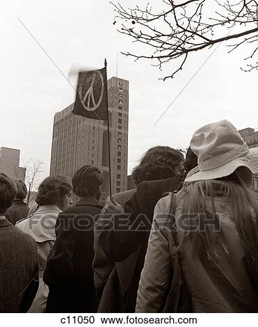 1960S 1970S Crowd Of Young People In Civil Disobedience Protest Demonstration Against Vietnam War View Large Photo Image Stock Image - 1960S 1970S Crowd Of Young People In Civil Disobedience Protest Demonstration Against Vietnam War. Fotosearch
