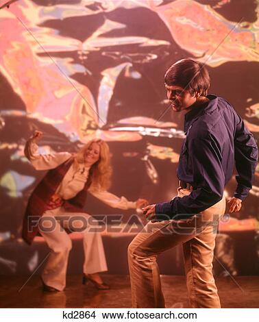 Picture - 1960S 1970S Man Woman Dancing With Psychedelic Background. Fotosearch