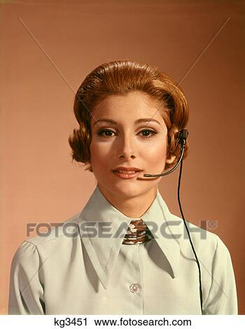 1960S 1970S Portrait Woman Telephone Operator Receptionist Office Worker Wearing Headset View Large Photo Image Stock Image - 1960S 1970S Portrait Woman Telephone Operator Receptionist Office Worker Wearing Headset. Fotosearch