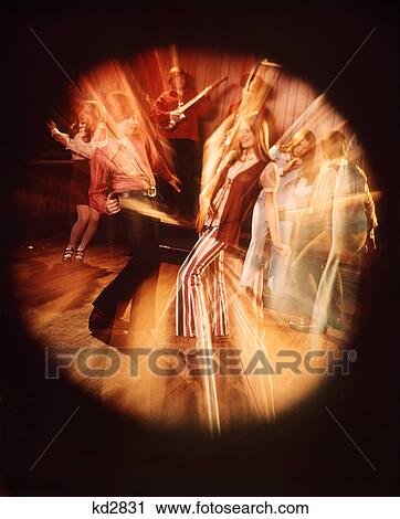 Stock Image - 1960S 1970S Teen Couple Dancing Rock Band Music Bands Blurred Circular Vignette. Fotosearch
