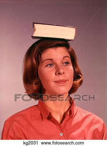 1960S 1970S Young Teenage Girl Woman Balancing Book On Head View Large Photo Image Stock Image - 1960S 1970S Young Teenage Girl Woman Balancing Book On Head. Fotosearch