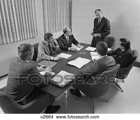 1960S 6 Executive Businessmen Around Conference Table Board Meeting View Large Photo Image Picture - 1960S 6 Executive Businessmen Around Conference Table Board Meeting. Fotosearch