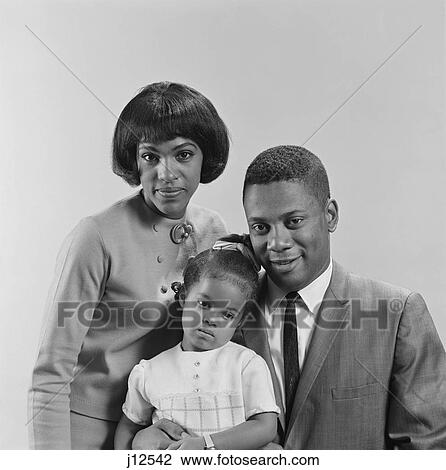 1960S African American Family Portrait Father Mother Daughter Looking At Camera View Large Photo Image Stock Image - 1960S African American Family Portrait Father Mother Daughter Looking At Camera. Fotosearch