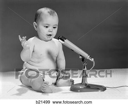 1960S Baby In Diaper Speaking Into Microphone View Large Photo Image Stock Photo - 1960S Baby In Diaper Speaking Into Microphone. Fotosearch