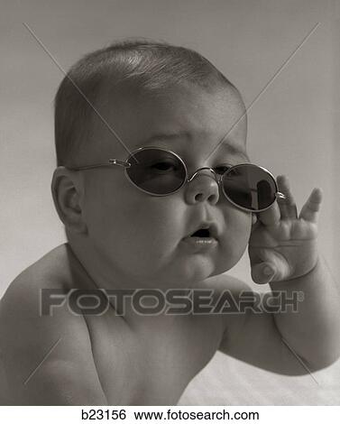 1960S Baby Wearing Granny Glasses Sunglasses View Large Photo Image Stock Photograph - 1960S Baby Wearing Granny Glasses Sunglasses. Fotosearch