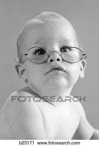 1960S Baby Wearing Wire-Rimmed Granny Glasses View Large Photo Image Stock Image - 1960S Baby Wearing Wire-Rimmed Granny Glasses. Fotosearch