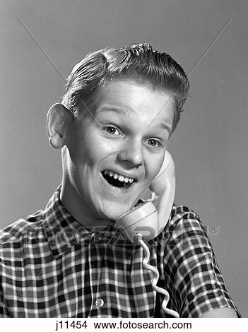1960S Boy On Telephone With Excited Expression View Large Photo Image Picture - 1960S Boy On Telephone With Excited Expression. Fotosearch