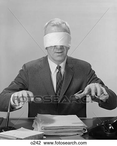 1960S Business Man Hands Hovering Over Desk Wearing Blindfold View Large Photo Image Stock Image - 1960S Business Man Hands Hovering Over Desk Wearing Blindfold. Fotosearch