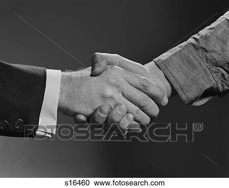 1960S Close-Up Handshake Between Businessman And Laborer View Large Photo Image Stock Image - 1960S Close-Up Handshake Between Businessman And Laborer. Fotosearch