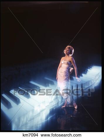 Picture - 1960S Composite Image Blonde Woman Wearing Formal Gown Piano Keyboard Music Singer Performer. Fotosearch