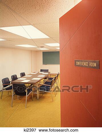 1960S Conference Room Interior With Table Chairs Chalkboard Open Door Ajar View Large Photo Image Stock Photo - 1960S Conference Room Interior With Table Chairs Chalkboard Open Door Ajar. Fotosearch