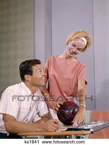 1960S Couple Husband Wife Bowling Checking The Score Indoor View Large Photo Image Stock Image - 1960S Couple Husband Wife Bowling Checking The Score Indoor . Fotosearch