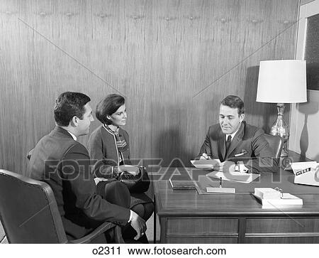 1960S Couple Meeting Interviewing With Businessman Attorney Banker View Large Photo Image Stock Image - 1960S Couple Meeting Interviewing With Businessman Attorney Banker. Fotosearch