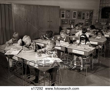1960S Elementary Classroom Children At Desks Writing Studying View Large Photo Image Stock Image - 1960S Elementary Classroom Children At Desks Writing Studying. Fotosearch