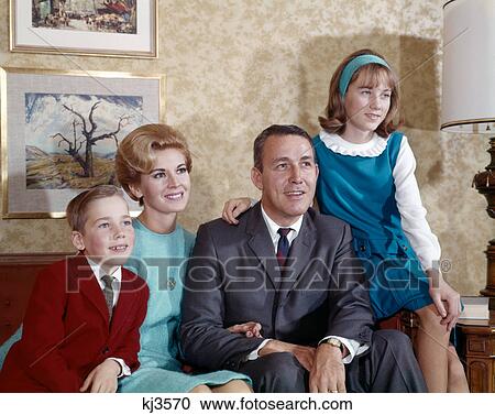 1960S Family Portrait Mother Father Daughter Son Indoor View Large Photo Image Stock Image - 1960S Family Portrait Mother Father Daughter Son Indoor . Fotosearch