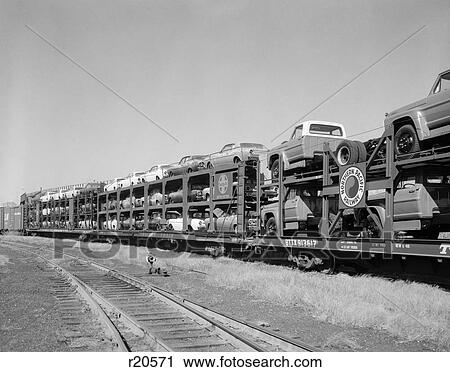 1960S Freight Train Carrying Cars & Pick-Up Trucks View Large Photo Image Stock Image - 1960S Freight Train Carrying Cars & Pick-Up Trucks. Fotosearch