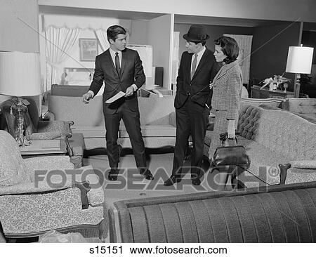 1960S Furniture Store Salesman Talking To Couple View Large Photo Image Stock Image - 1960S Furniture Store Salesman Talking To Couple. Fotosearch