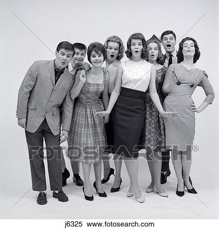 1960S Group Of 8 Fashionable Teens Standing Full Length Looking Amazed View Large Photo Image Stock Photography - 1960S Group Of 8 Fashionable Teens Standing Full Length Looking Amazed. Fotosearch
