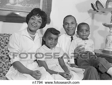 1960S Happy Smiling African-American Family On Couch View Large Photo Image Picture - 1960S Happy Smiling African-American Family On Couch. Fotosearch