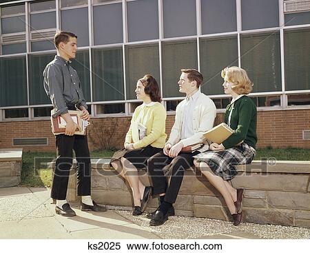 Stock Photography - 1960S High School Students Teenage Boys Girls Talking After School. Fotosearch