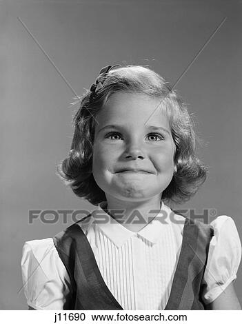 1960S Little Girl Portrait With Mischievous Smile View Large Photo Image Stock Image - 1960S Little Girl Portrait With Mischievous Smile. Fotosearch