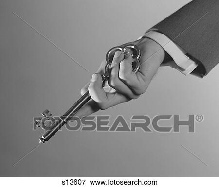 1960S Male Hand Holding Large Key View Large Photo Image Stock Photo - 1960S Male Hand Holding Large Key. Fotosearch