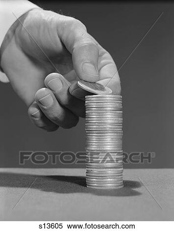 1960S Male Hand Stacking Coins Money View Large Photo Image Stock Photography - 1960S Male Hand Stacking Coins Money. Fotosearch