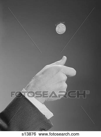 1960S Male Hand Tossing Flipping A Coin View Large Photo Image Stock Photograph - 1960S Male Hand Tossing Flipping A Coin. Fotosearch