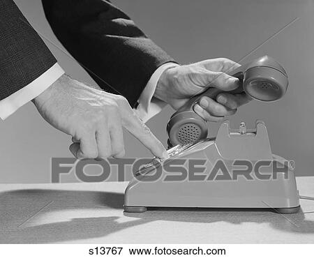 1960S Male Hands Dialing Rotary Telephone View Large Photo Image Stock Photo - 1960S Male Hands Dialing Rotary Telephone . Fotosearch
