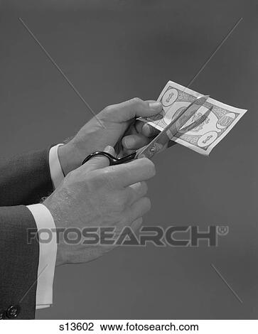 1960S Male Hands With Scissors Cutting Dollar Bill In Half View Large Photo Image Stock Image - 1960S Male Hands With Scissors Cutting Dollar Bill In Half . Fotosearch