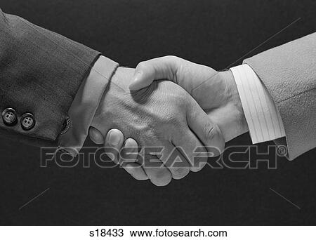 Stock Image - 1960S Male Handshake. Fotosearch