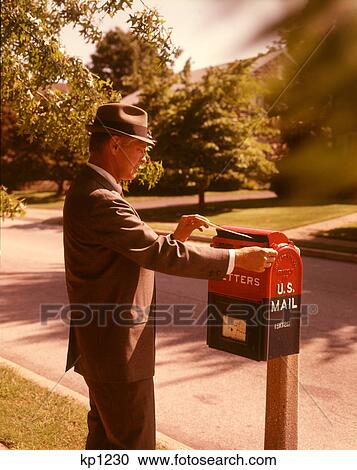 1960S Man Business Man Suit Hat Mailing Letter Mailbox Mail Drop Box Post Postal Suburban Street View Large Photo Image Stock Image - 1960S Man Business Man Suit Hat Mailing Letter Mailbox Mail Drop Box Post Postal Suburban Street . Fotosearch