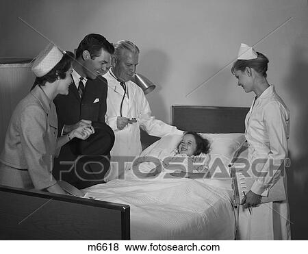 1960S Man Doctor Woman Nurse Mother Father Seeing Visiting Smiling Little Girl Patient In Hospital Bed View Large Photo Image Stock Photo - 1960S Man Doctor Woman Nurse Mother Father Seeing Visiting Smiling Little Girl Patient In Hospital Bed. Fotosearch