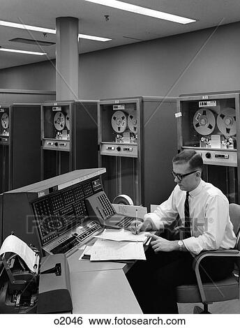 1960S Man In Shirt & Tie & Glasses At Control Console For Ibm Data Processing System View Large Photo Image Stock Photograph - 1960S Man In Shirt & Tie & Glasses At Control Console For Ibm Data Processing System. Fotosearch