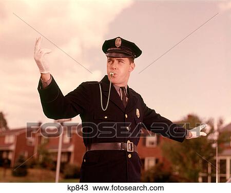 1960S Man Policeman Blowing Whistle Directing Traffic View Large Photo Image Stock Image - 1960S Man Policeman Blowing Whistle Directing Traffic. Fotosearch