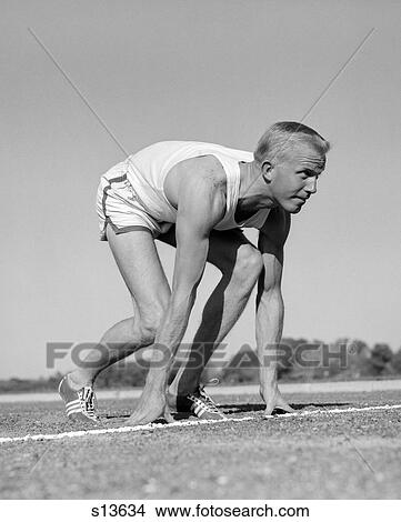 1960S Man Sprinter Runner At The Starting Line For Foot Race Outdoor View Large Photo Image Picture - 1960S Man Sprinter Runner At The Starting Line For Foot Race Outdoor. Fotosearch