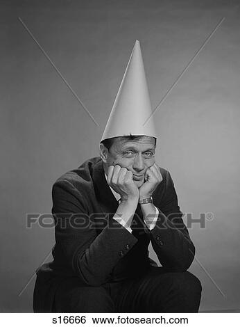 1960S Man Wearing Dunce Cap View Large Photo Image Stock Photograph - 1960S Man Wearing Dunce Cap. Fotosearch