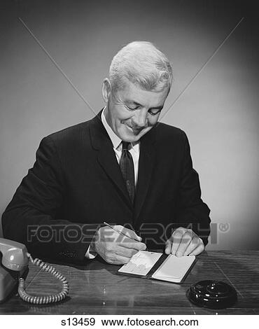 1960S Man Writing Check From Checkbook View Large Photo Image Stock Photo - 1960S Man Writing Check From Checkbook . Fotosearch