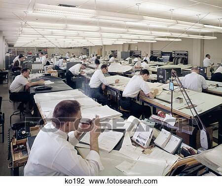 1960S Office Full Of Drafting Tables Designer Man Lighting-Up A Pipe Of Tobacco Indoor Industry View Large Photo Image Stock Image - 1960S Office Full Of Drafting Tables Designer Man Lighting-Up A Pipe Of Tobacco Indoor Industry . Fotosearch