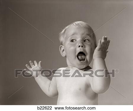 1960S Portrait Baby With Hands In Air And Eyes & Mouth Wide Open View Large Photo Image Stock Image - 1960S Portrait Baby With Hands In Air And Eyes & Mouth Wide Open. Fotosearch
