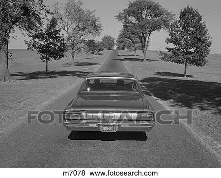 1960S Rear View Automobile Driving Down Country Road View Large Photo Image Stock Photo - 1960S Rear View Automobile Driving Down Country Road. Fotosearch