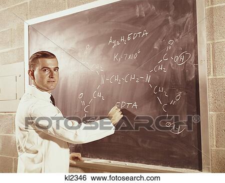 1960S Science Professor Writing A Formula For Chelating Agent On Chalkboard View Large Photo Image Stock Photograph - 1960S Science Professor Writing A Formula For Chelating Agent On Chalkboard . Fotosearch