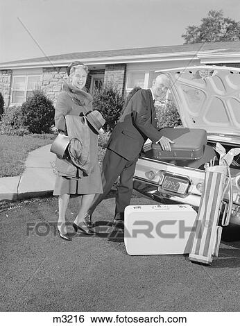 1960S Senior Man Woman Husband Wife Packing Trunk With Luggage View Large Photo Image Stock Photograph - 1960S Senior Man Woman Husband Wife Packing Trunk With Luggage. Fotosearch