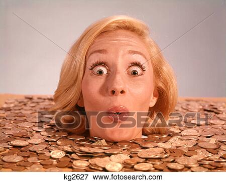 1960S Silly Wacky Expression On Funny Woman Up To Neck In Coins And Currency Drowning In Luck View Large Photo Image Stock Photo - 1960S Silly Wacky Expression On Funny Woman Up To Neck In Coins And Currency Drowning In Luck . Fotosearch