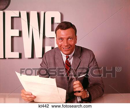 1960S Smiling Broadcast Reporter Newsman Announcer At News Desk Holding Microphone Papers Reading Report View Large Photo Image Stock Image - 1960S Smiling Broadcast Reporter Newsman Announcer At News Desk Holding Microphone Papers Reading Report. Fotosearch