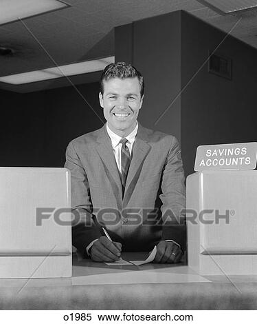 1960s Smiling Man Bank Teller Savings Accounts Sign On Counter