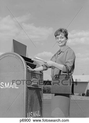 1960S Smiling Woman Dropping Letters In Postal Mail Box Looking At Camera View Large Photo Image Stock Image - 1960S Smiling Woman Dropping Letters In Postal Mail Box Looking At Camera. Fotosearch