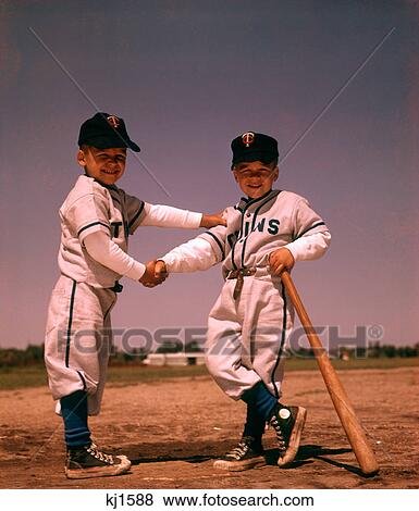 1960S Two Boys Playing Little League Baseball Shaking Hands View Large Photo Image Stock Photo - 1960S Two Boys Playing Little League Baseball Shaking Hands. Fotosearch