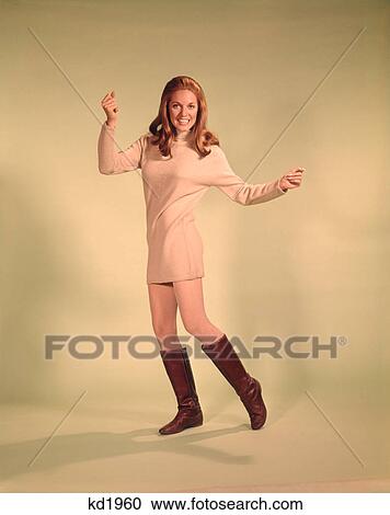 1960S Woman Dancer In Tan Dress And Boots White Fishnet Stockings View Large Photo Image Stock Image - 1960S Woman Dancer In Tan Dress And Boots White Fishnet Stockings . Fotosearch