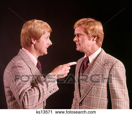 1970S Angry Red Haired Man In Plaid Suit Arguing With Himself View Large Photo Image Stock Image - 1970S Angry Red Haired Man In Plaid Suit Arguing With Himself. Fotosearch